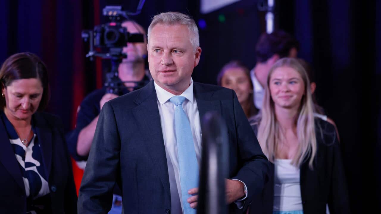 A man in a blue suit