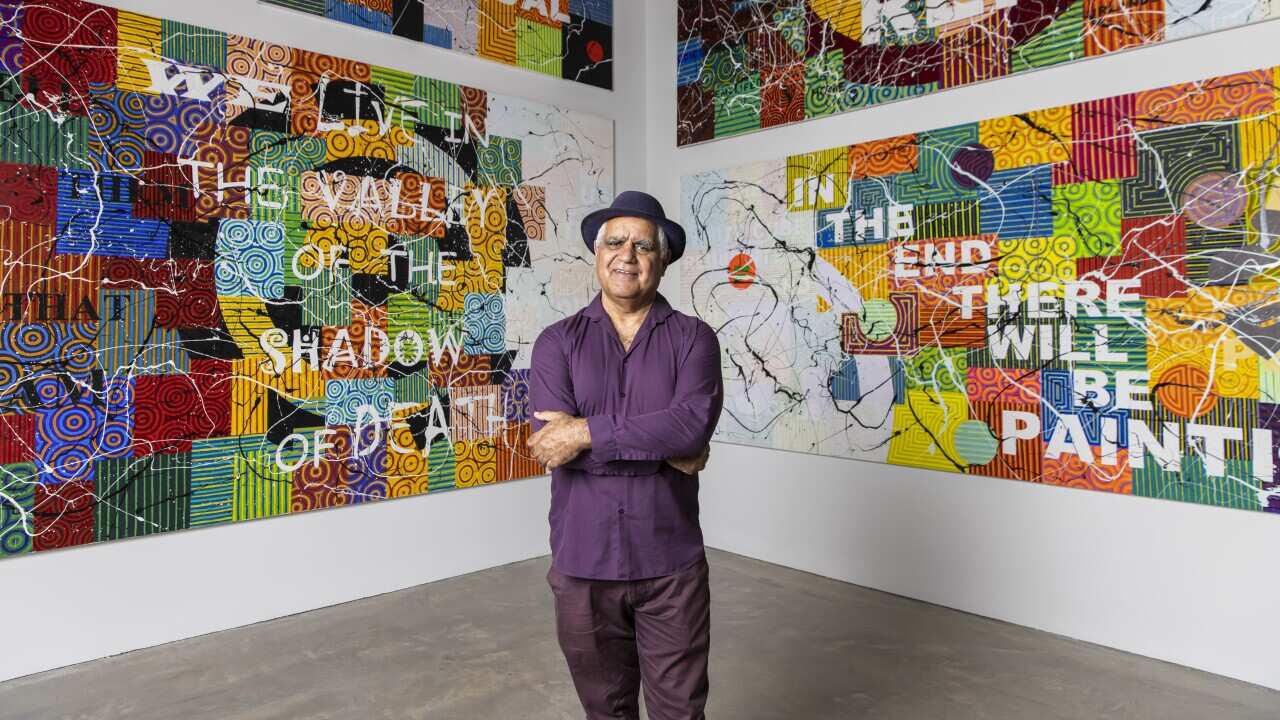 Richard Bell at his show You Can Go Now, Museum of Contemporary Art Australia, Sydney