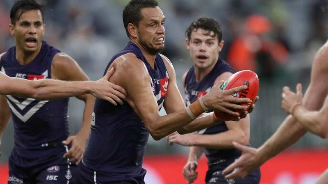 Michael Johnson of the Dockers in action