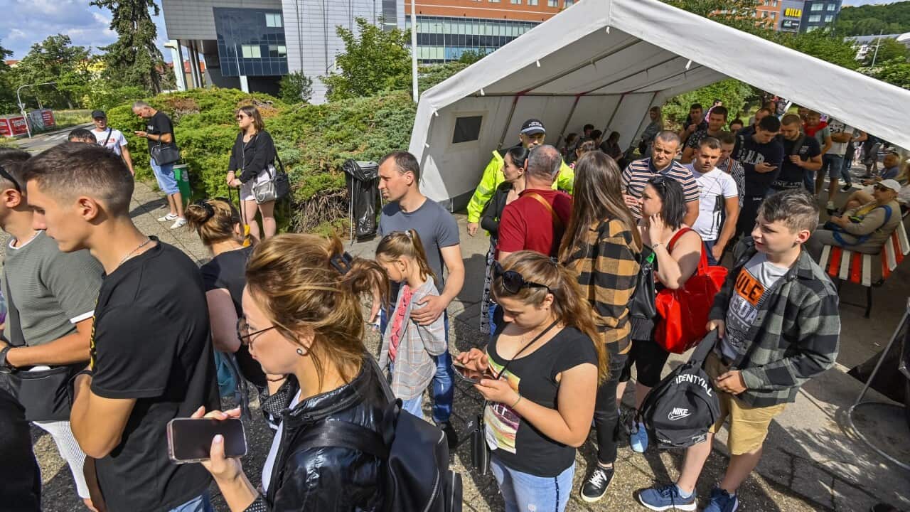 Ukrainian war refugees are seen outside regional assistance centre for Ukrainian refugees in Prague, Czech Republic, on June 14, 2022. Photo/Vit Simanek (CTK via AP Images)