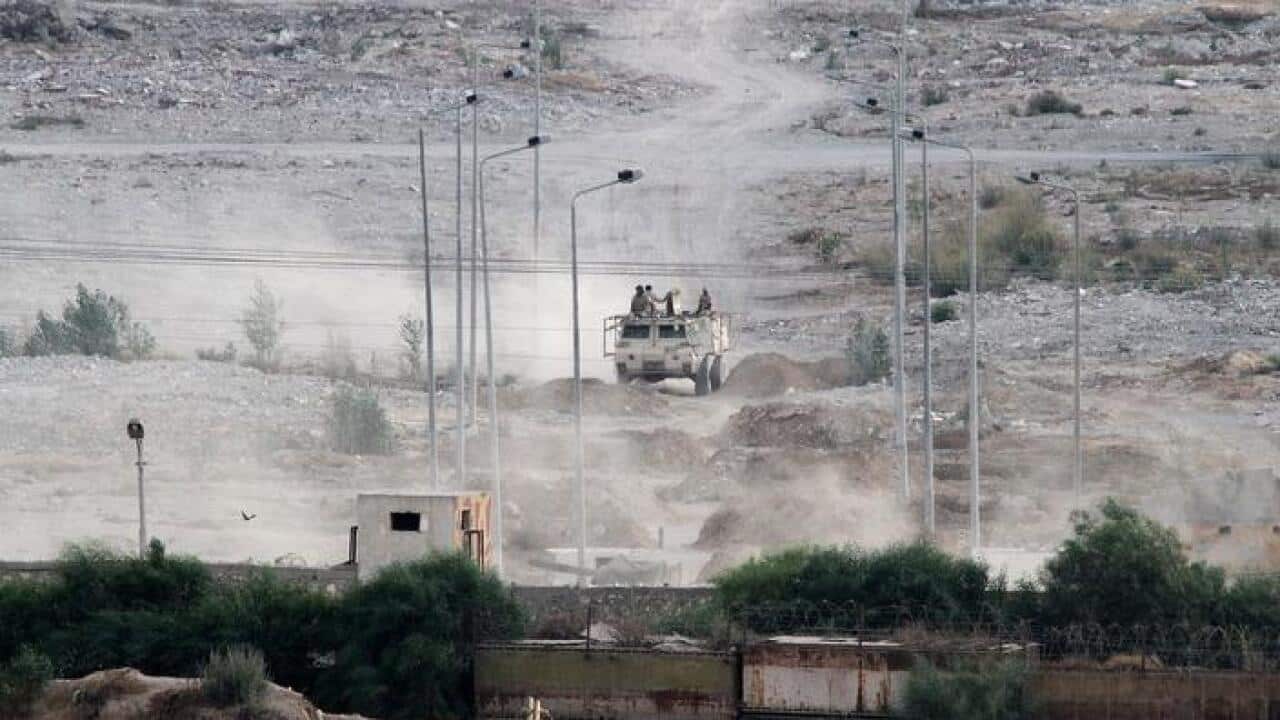 Egyptian soldiers patrol near the Gaza Strip (AAP)