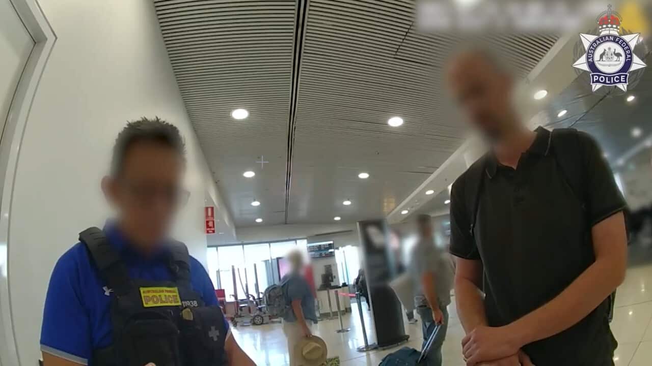 Investigator talking with accused