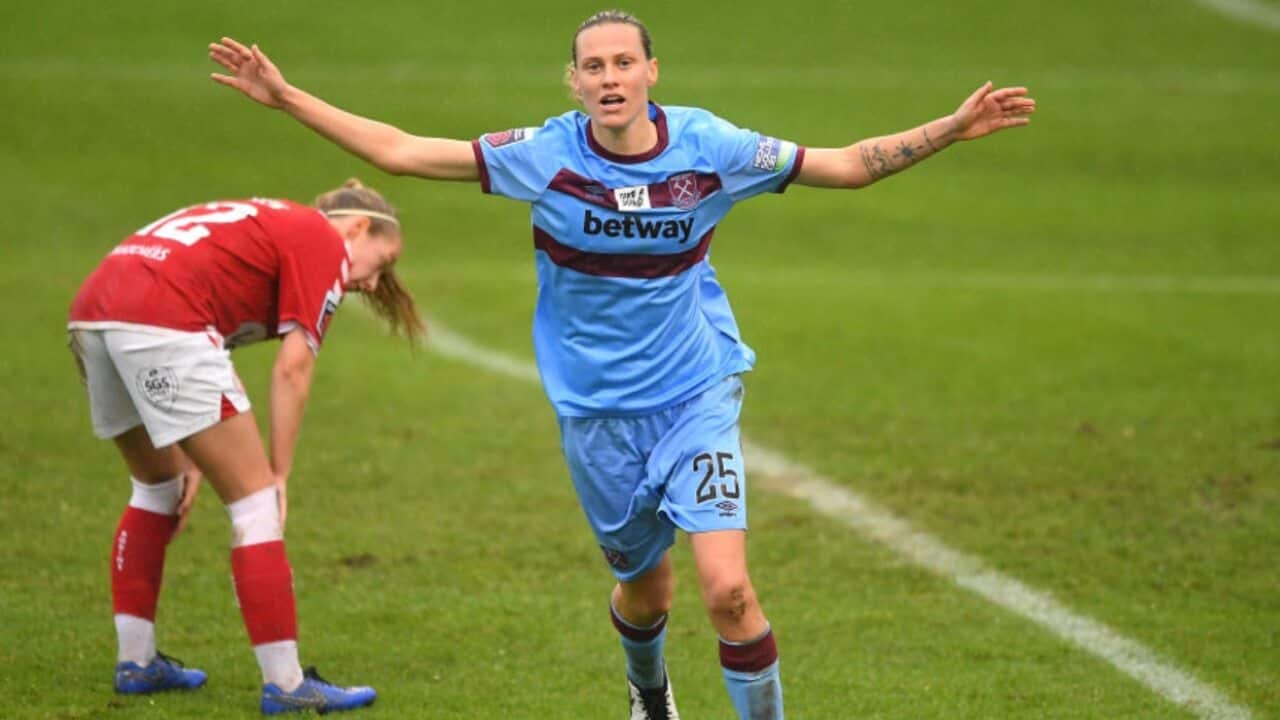 Emily van Egmond celebrates a goal for West Ham United