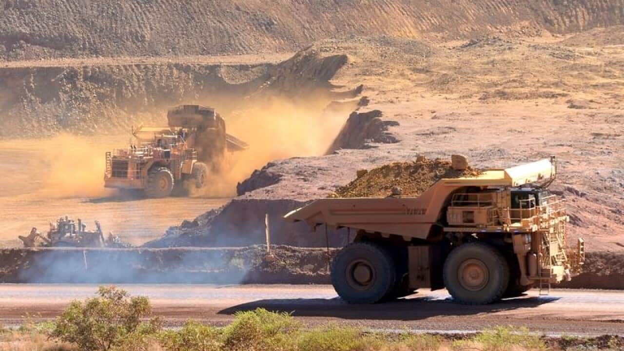 Ore excavation at the Rio Tinto iron ore mine in the Pilbara.