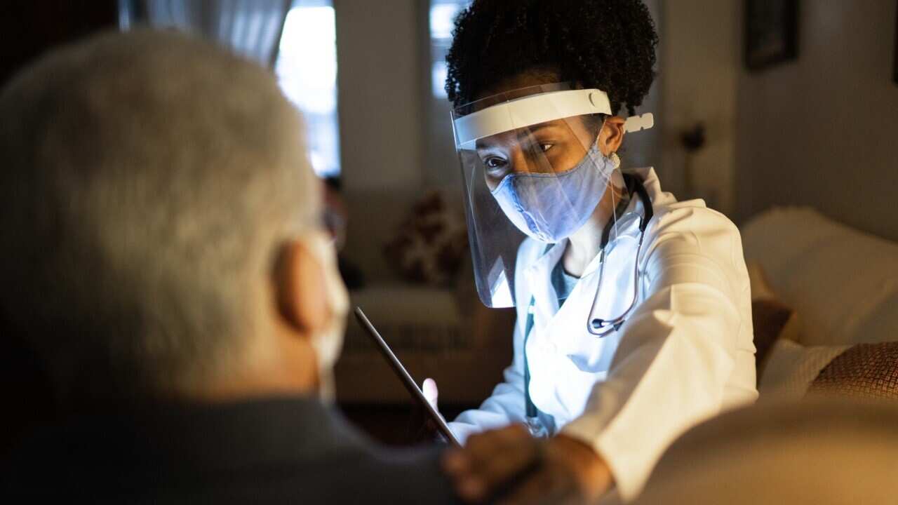 Nurse examining a patient Credit: Getty Images/FG Trade