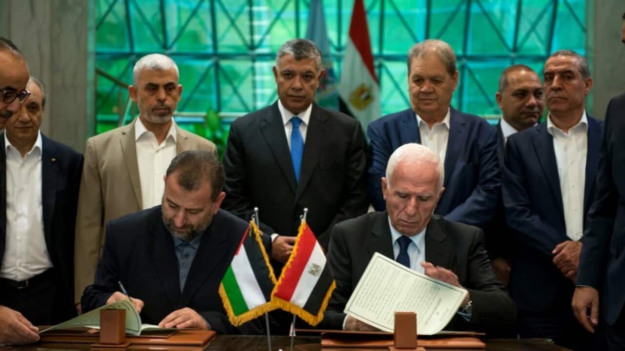 Hamas's Saleh al-Aruri, left, and Fatah's Azam al-Ahmad
