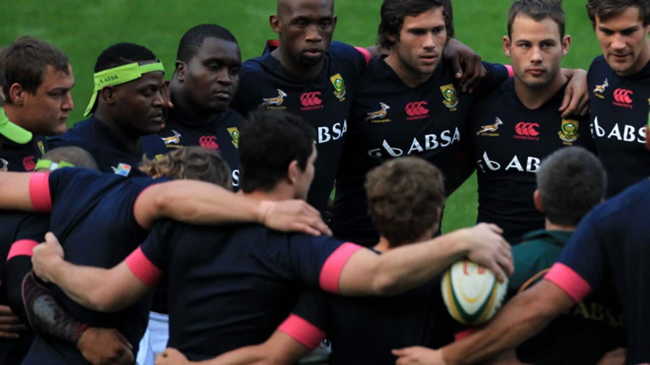 South African players form a human ring during a training session