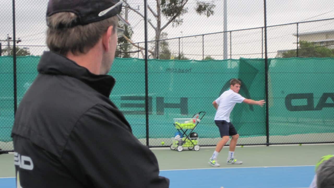 Coach Michael Baroch watches Stefen Skadarka SBS Dinham.jpg