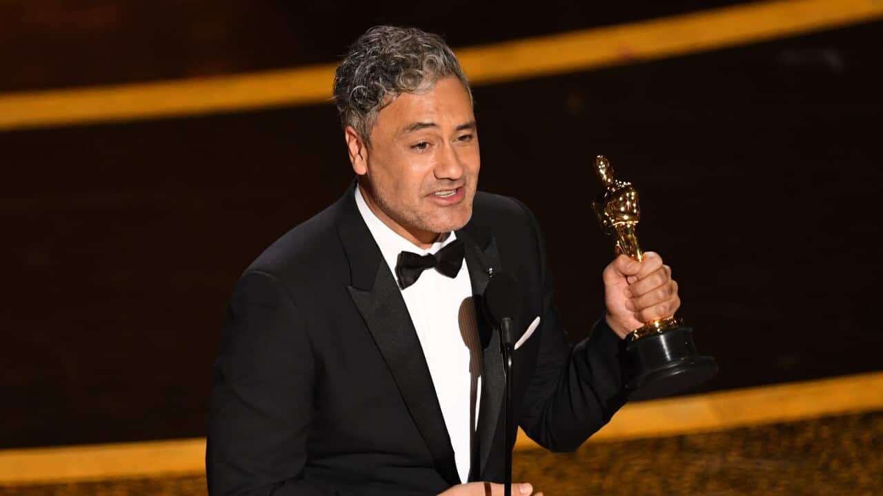 Taika Waititi accepts the Writing - Adapted Screenplay - award for 'Jojo Rabbit' during the 92nd Annual Academy Awards.