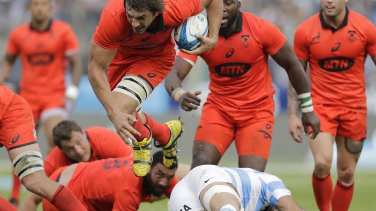South Africa's Eben Etzebeth runs with the ball