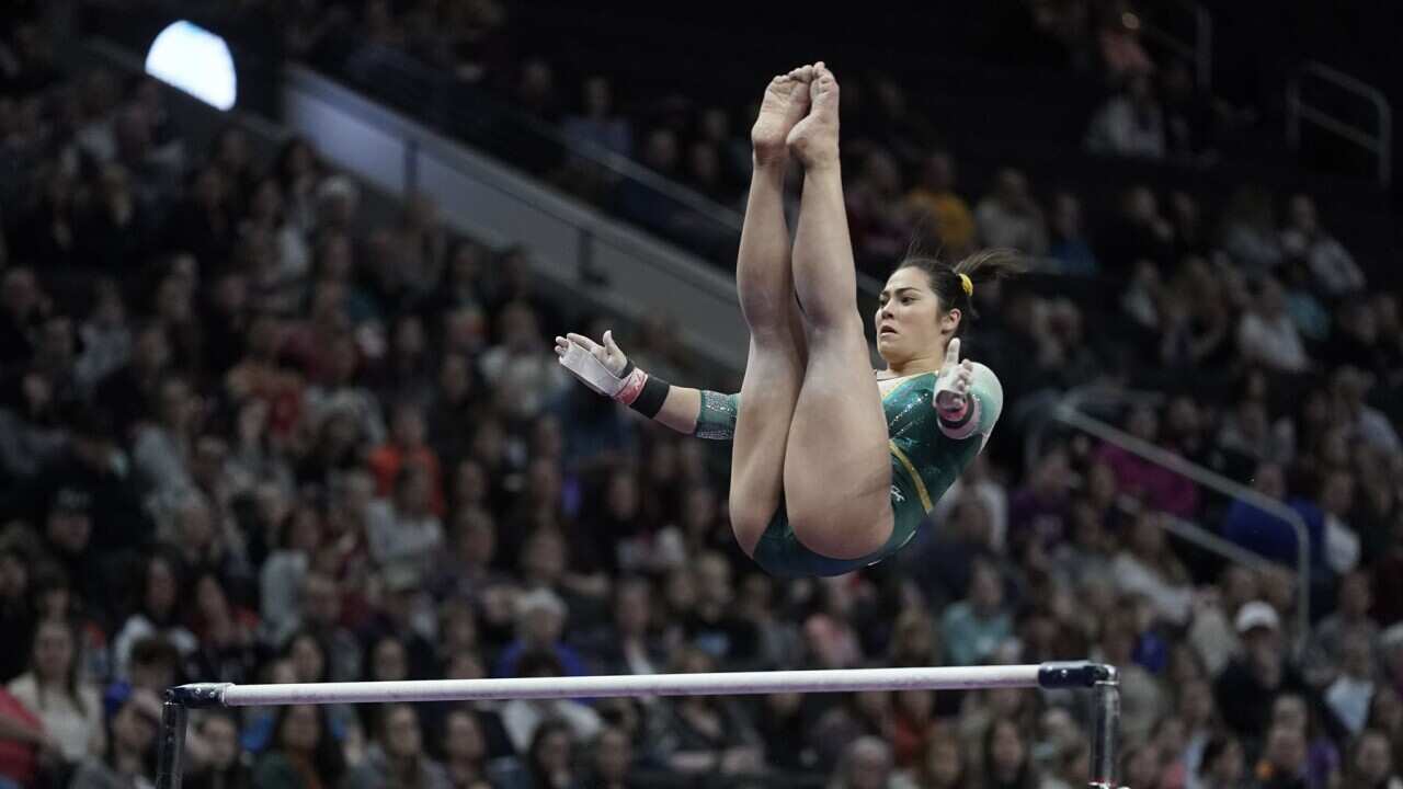 Georgia Goodwin of Australia performs on the bars