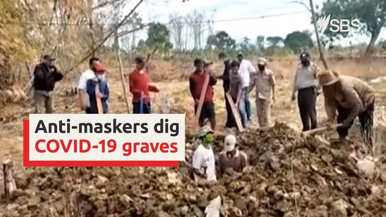 Indonesia punishes anti-maskers by having them dig COVID-19 graves
