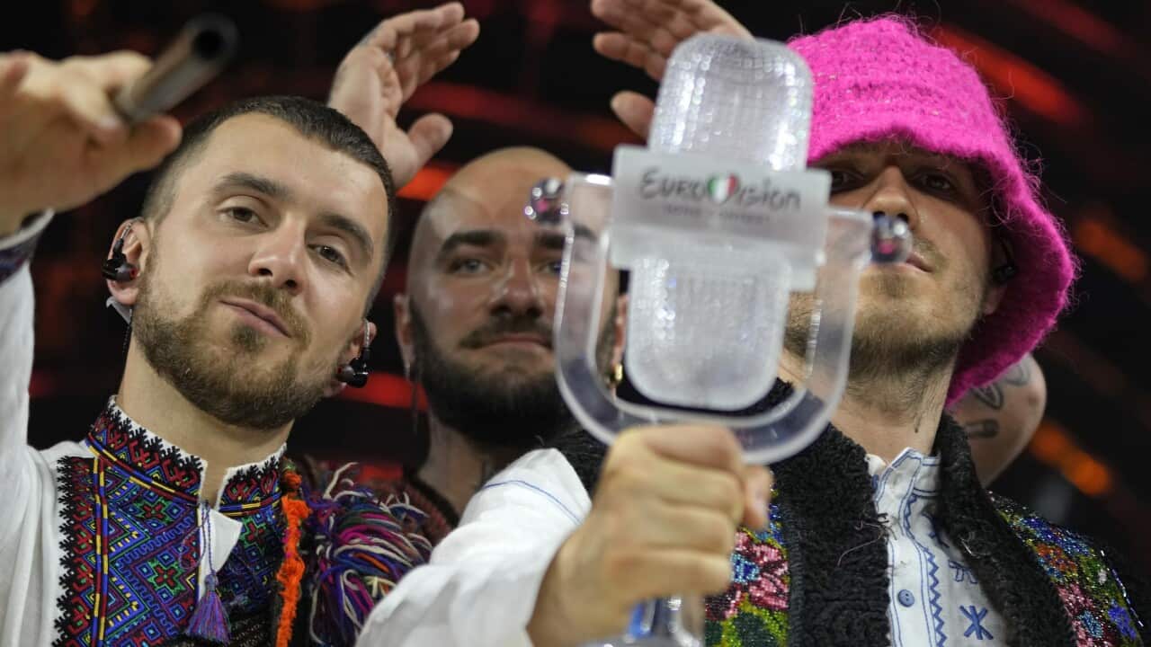 Members of the Kalush Orchestra from Ukraine celebrate after winning the Grand Final of the Eurovision Song Contest at Palaolimpico arena, in Turin, Italy, Saturday, May 14, 2022. (AP Photo/Luca Bruno)