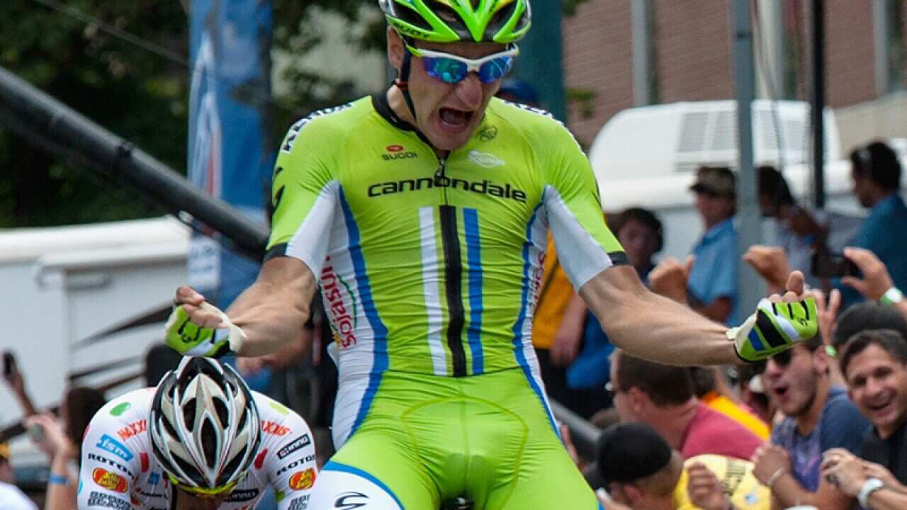 Elia Viviani celebrates his stage win.