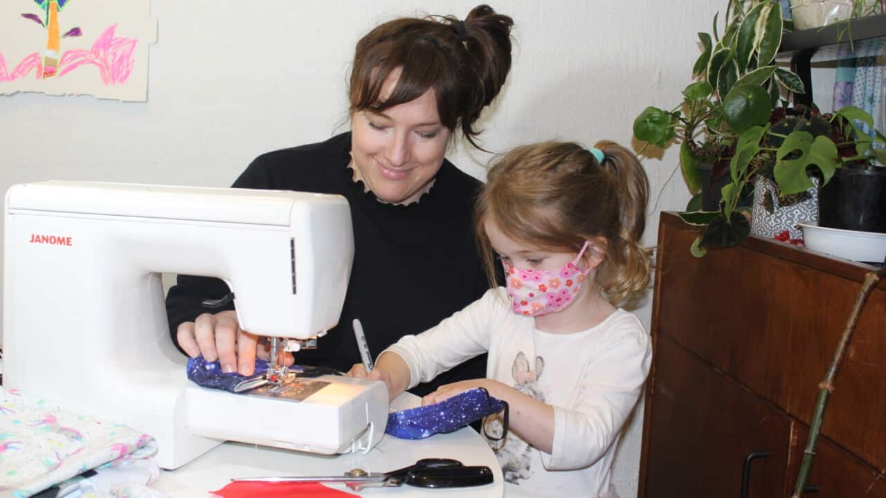 Dr Nadia Warner and her daughter sewing masks