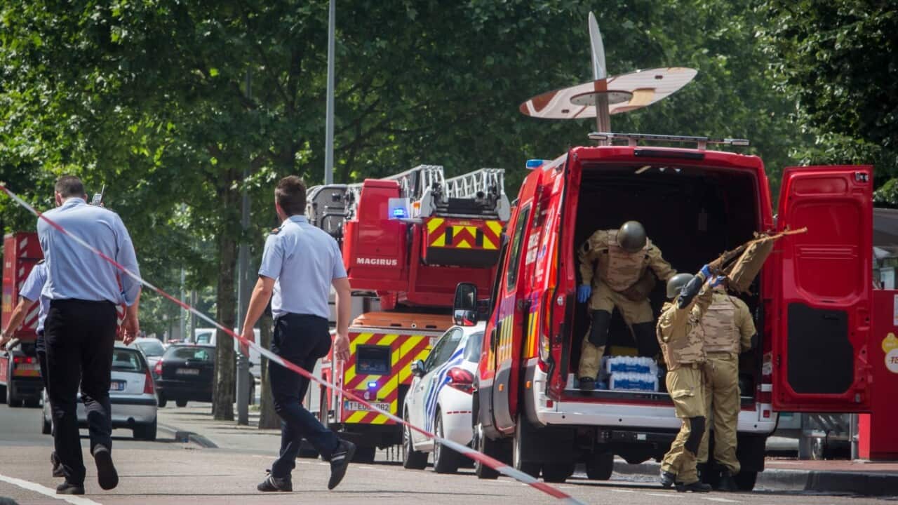 A bomb squad arrives at the scene following a shooting in Liege, Belgium, 29 May 2018.