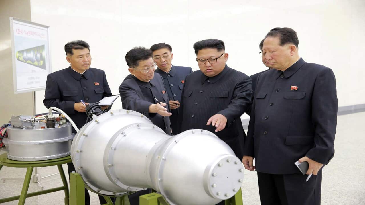 File photo shows North Korean leader Kim Jong Un at an undisclosed location in North Korea.