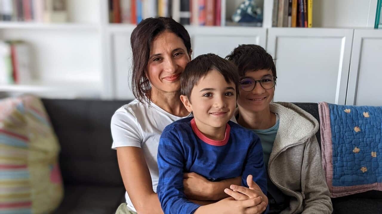 Italian expat Manuela Rispoli with her two sons in their Sydney apartment (Supplied).jpg