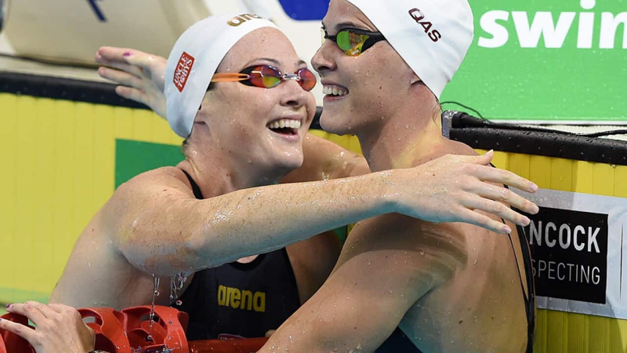 Cate Campbell (left) reacts with sister Bronte.