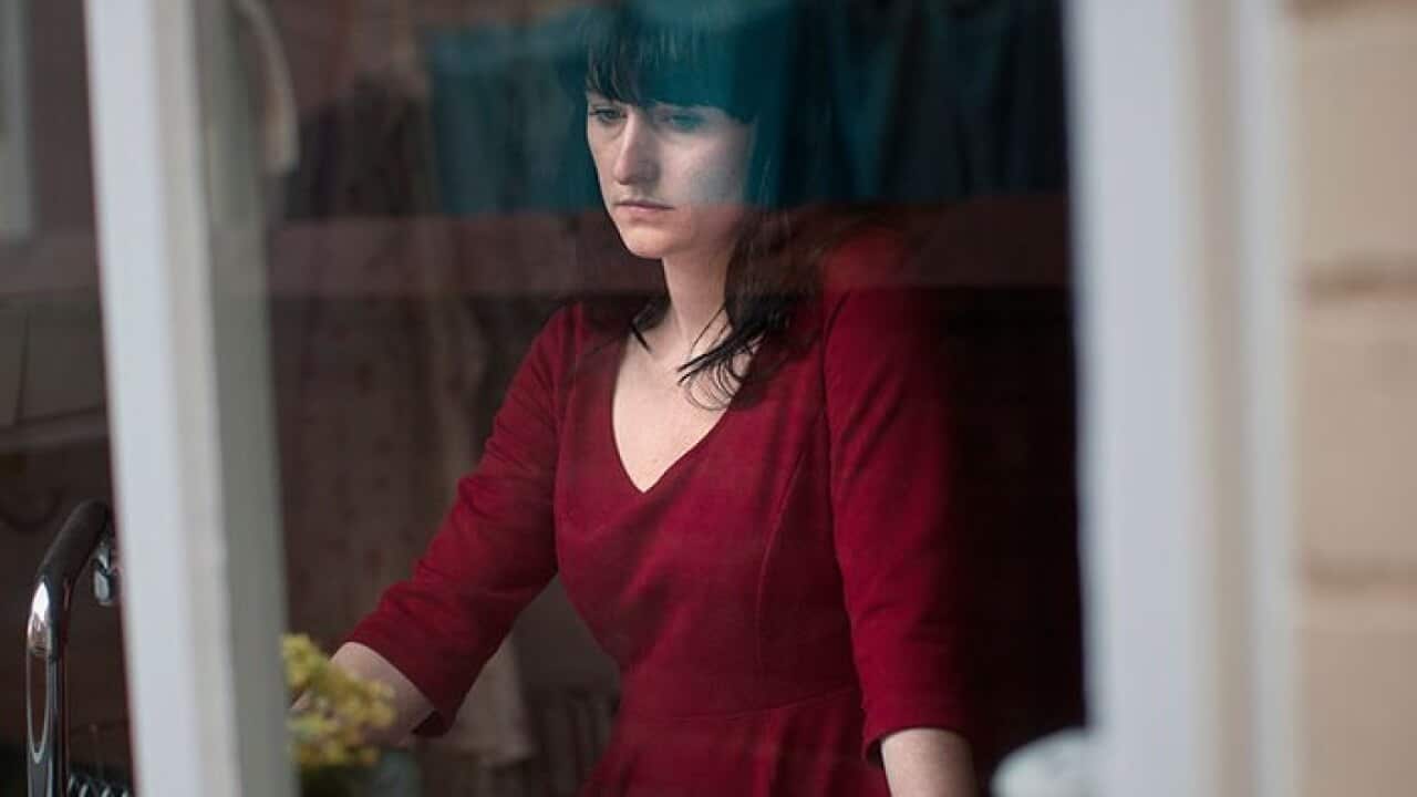 woman_by_the_window_getty