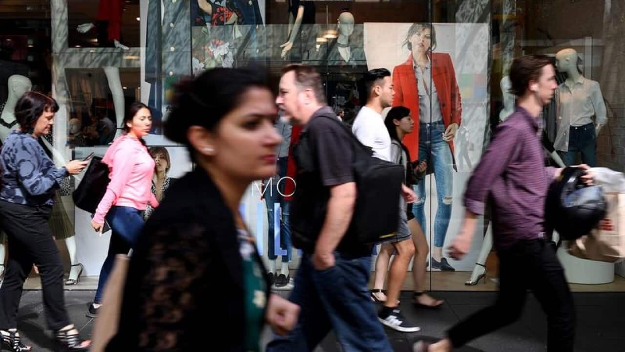 People are seen in Pitt Street Mall in Sydney