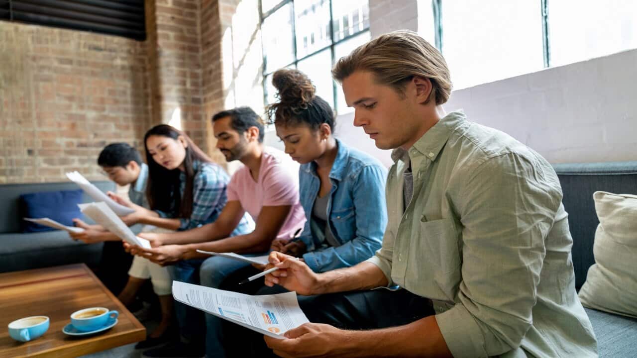people_at_an_office_waiting_for_a_job_interview_getty.jpg