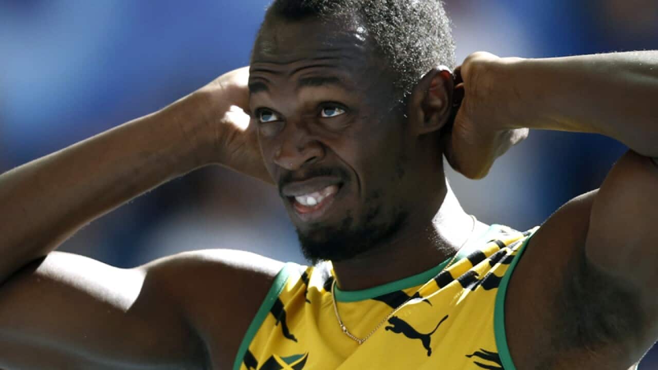Bolt safely into 200m semi-finals
