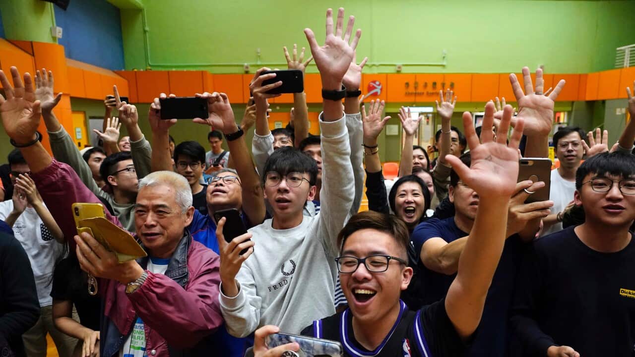 Pro-democracy supporters celebrate resuts in Hong Kong's district council elections
