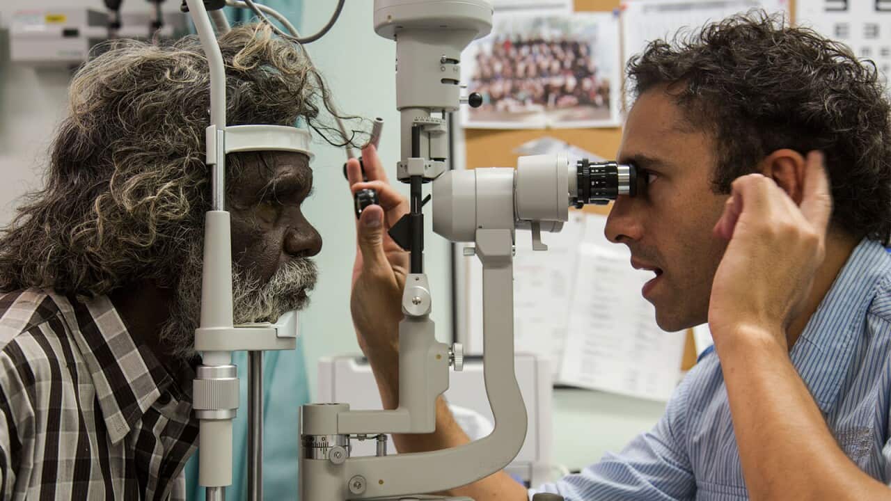 Dr Kris Rallah-Baker