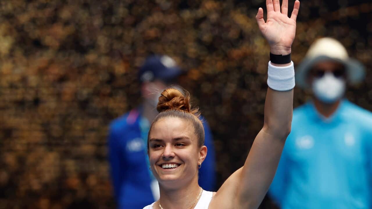 Maria Sakkari of Greece waves after defeating Tatjana Maria of Germany in their first round match at the Australian Open tennis championships in Melbourne, Australia, Monday, Jan. 17, 2022. (AP Photo/Hamish Blair)