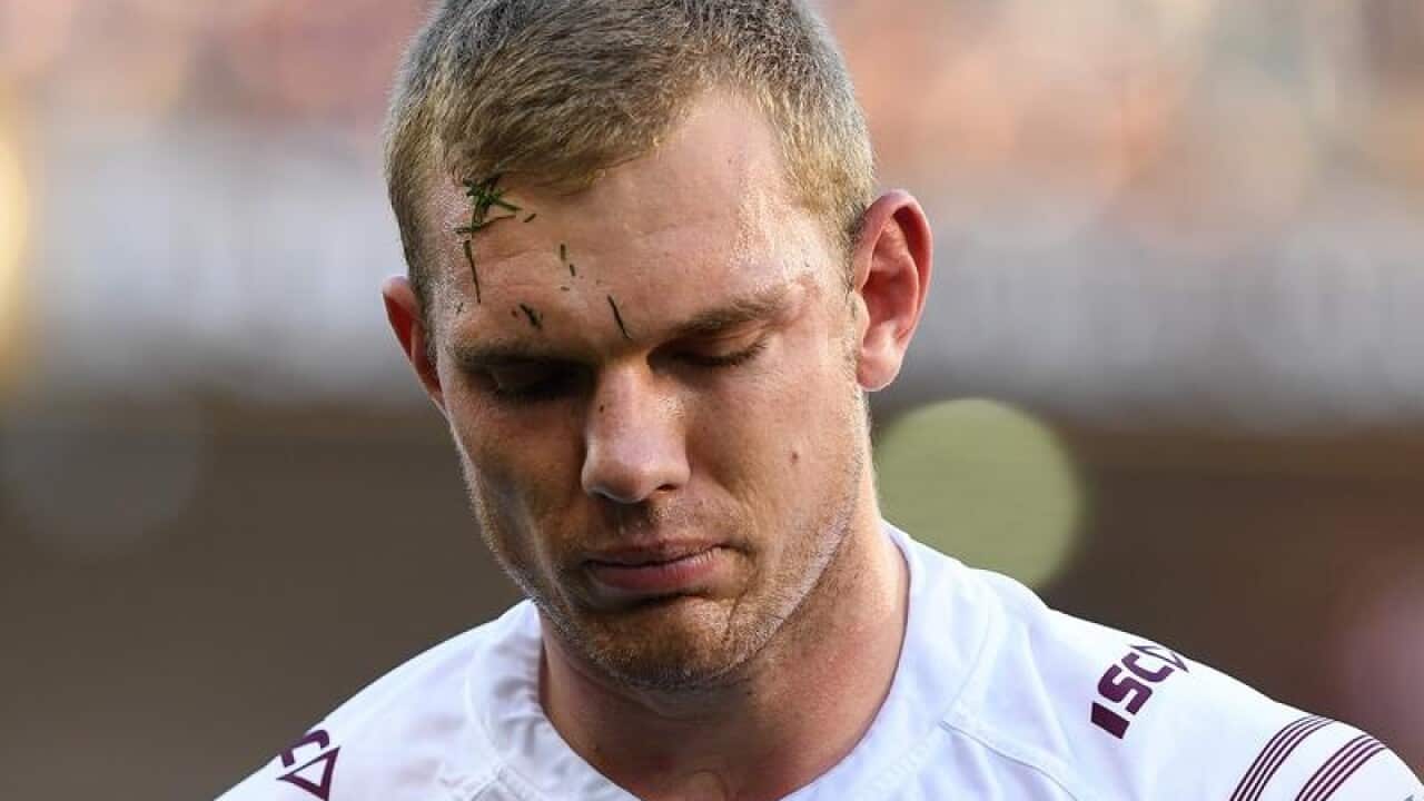 Thomas Trbojevic of the Sea Eagles leaves the field injured