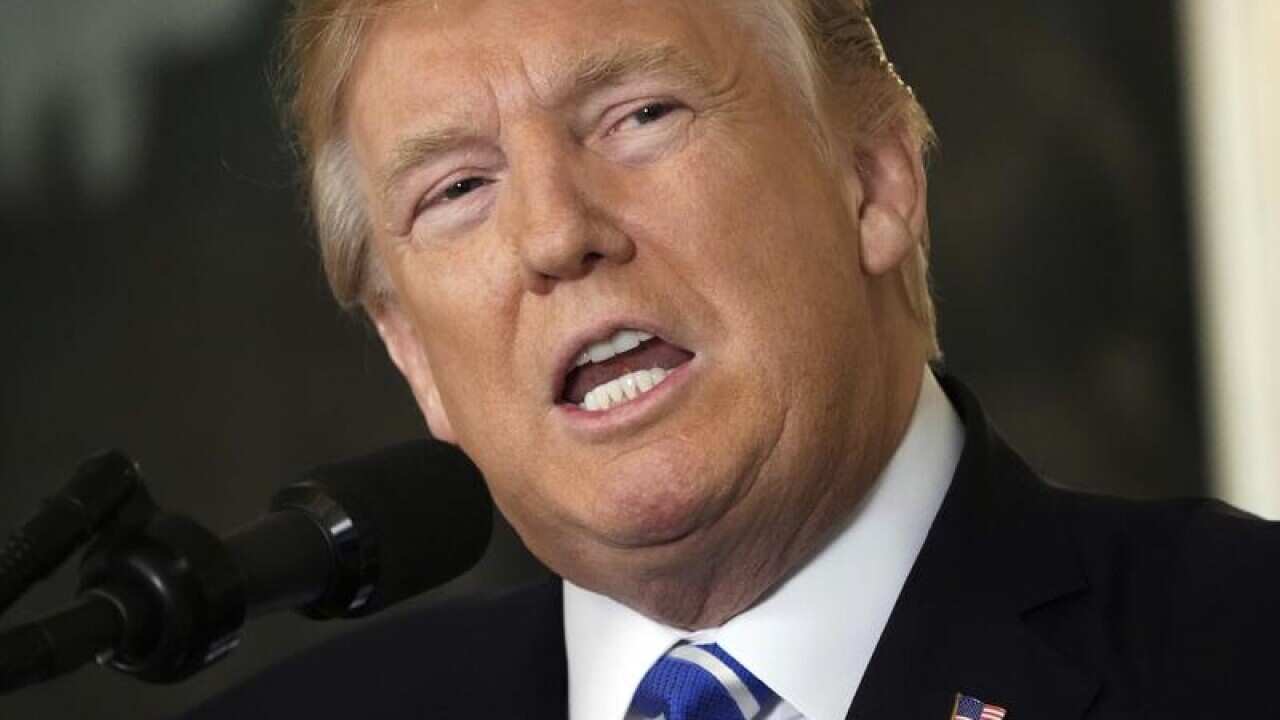 President Donald Trump speaks in the Diplomatic Reception Room.