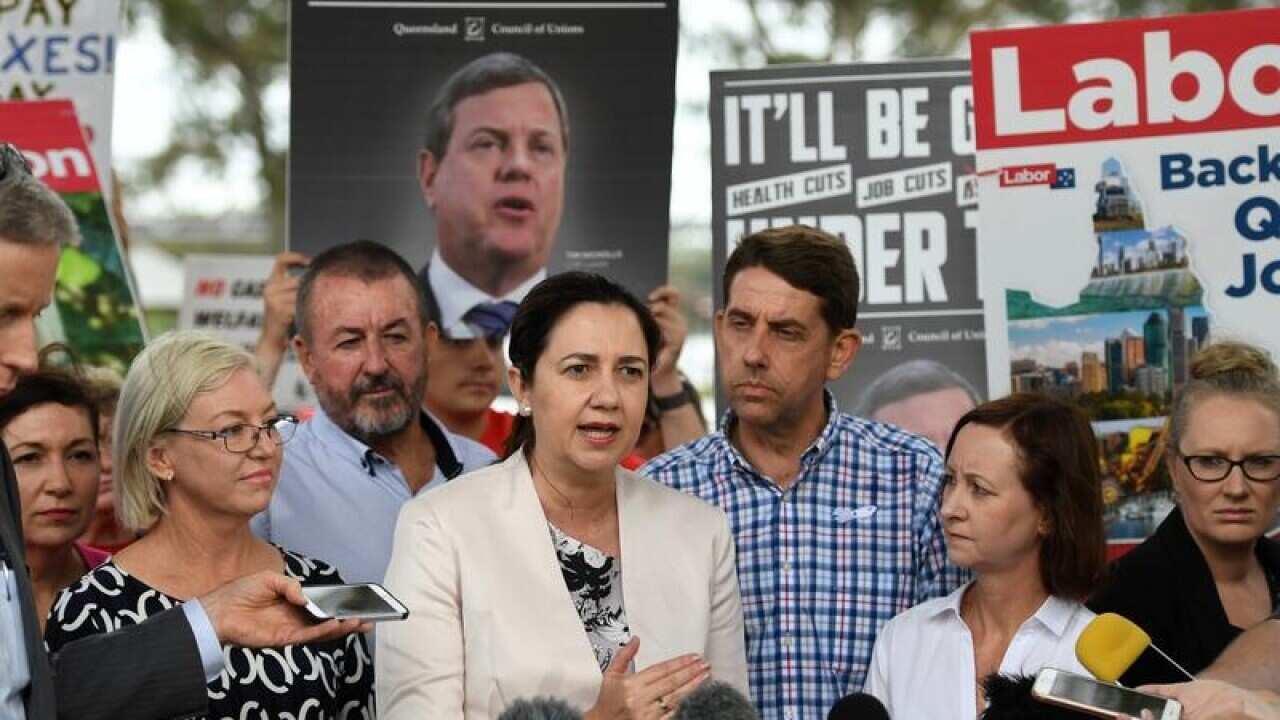 Queensland Premier Annastacia Palaszczuk talking to the media
