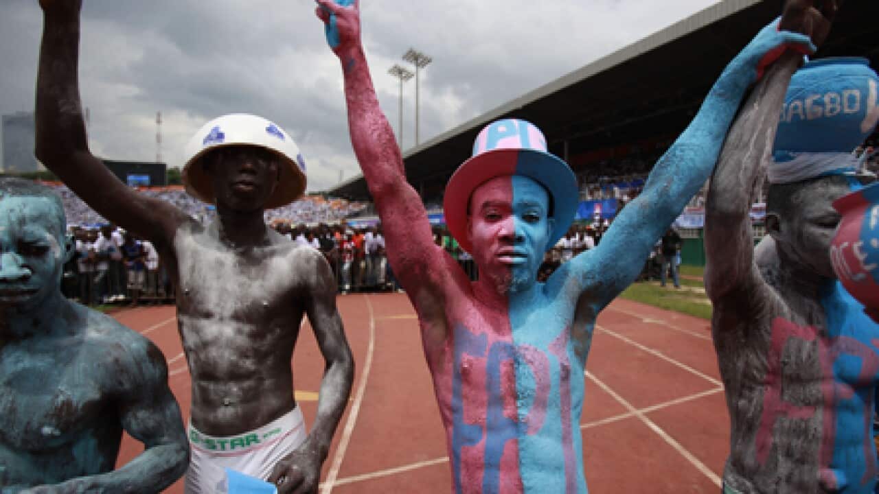 Ivory_coast_election_paint_AAP_101030_B_954615364