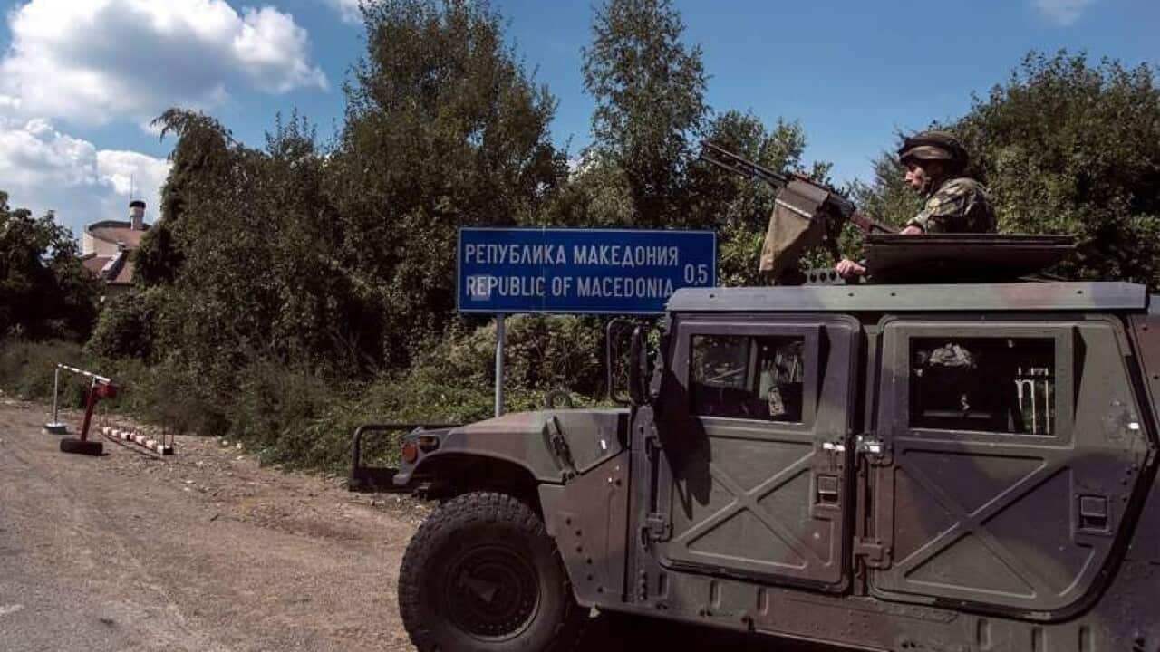 Bulgarian Military Forces near the border checkpoint at the Bulgarian-Macedonian border. (AAP)