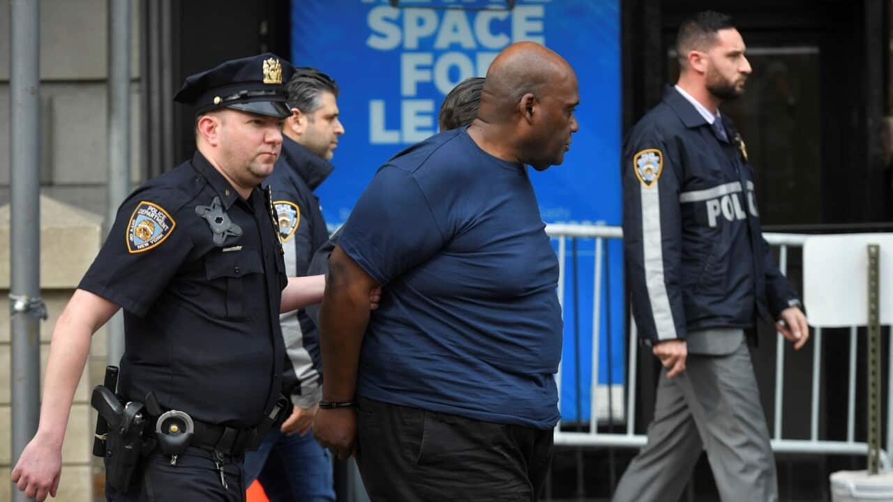 Suspect Frank James after being arrested in connection to the mass shooting at a subway station in New York (AP)
