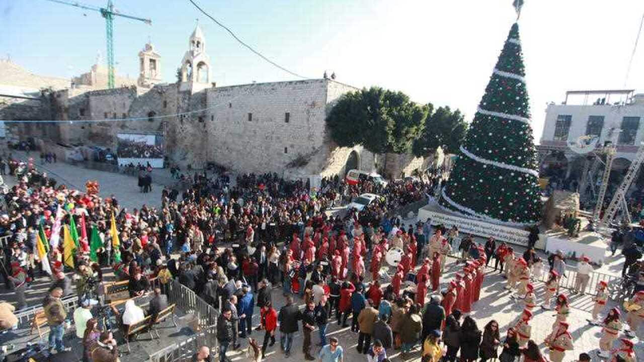 Crowds gather in Bethlehem on December 24.