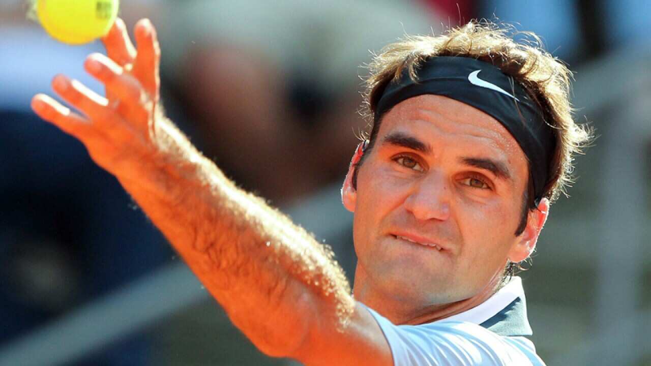 Federer digs deep to reach Hamburg semis