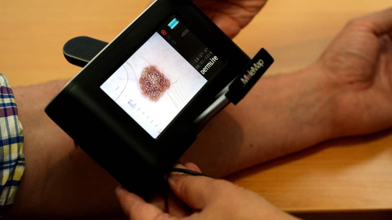 Stock images of a patient being checked for skin cancers