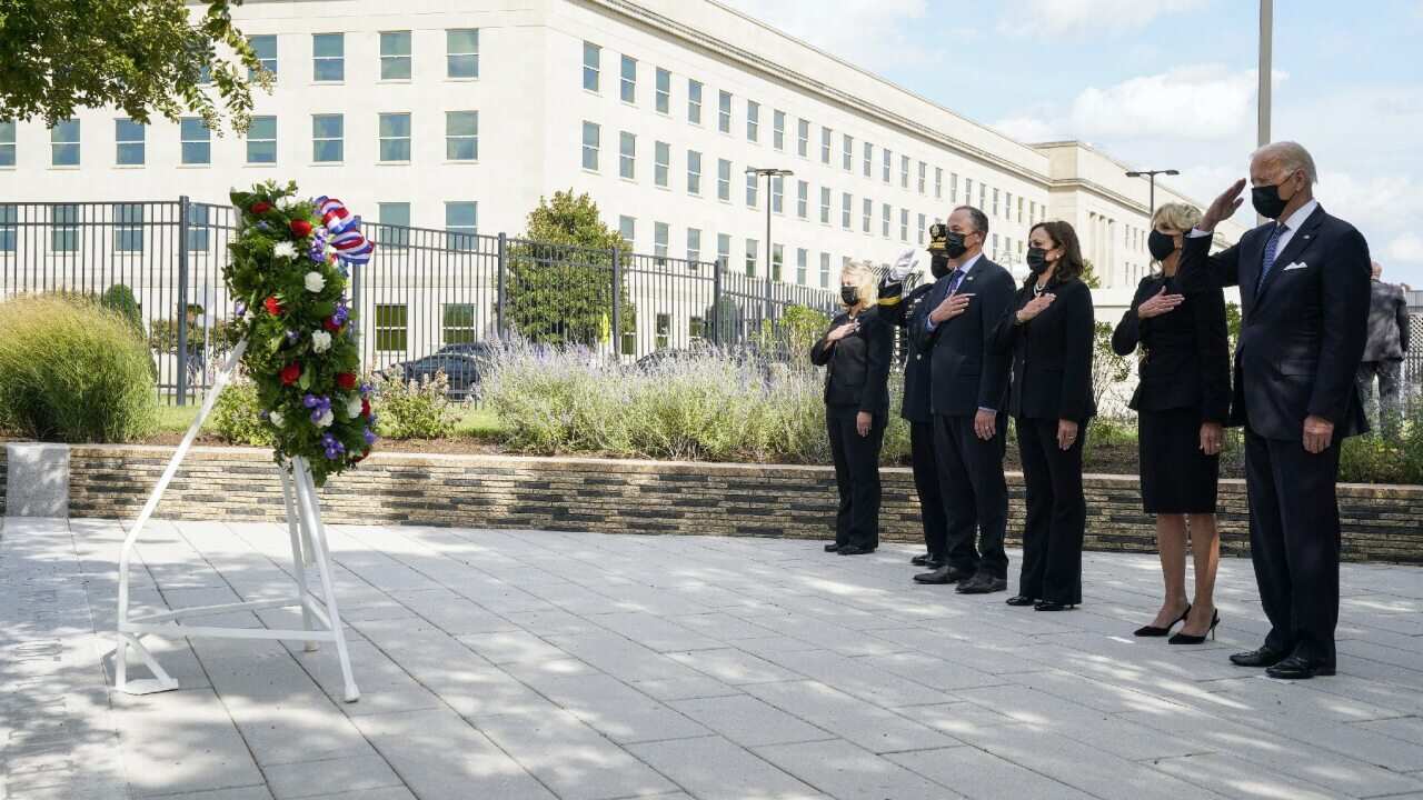 U.S. President Joe Biden and First lady Jill Biden, Vice President Kamala Harris and Douglas Craig Emhoff attend a wreath laying ceremony in Washington.