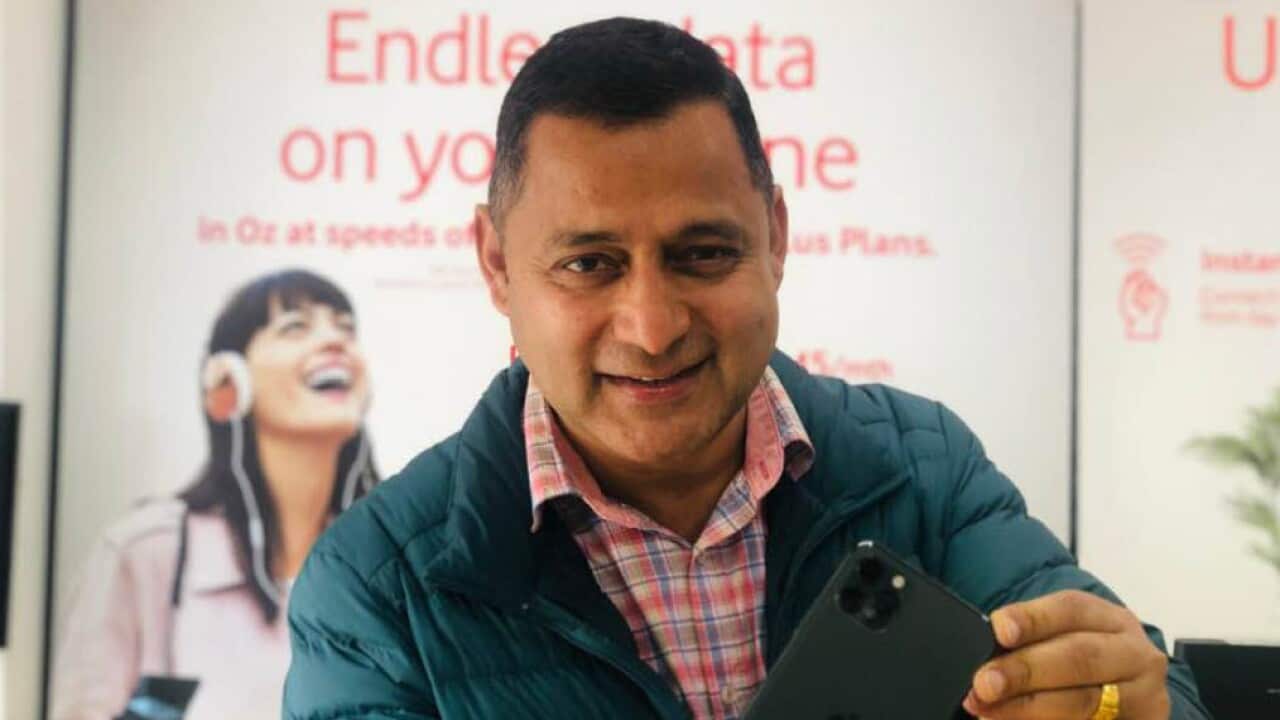 Yubaraj Bhattarai in Sydney runs a mobile phone shop