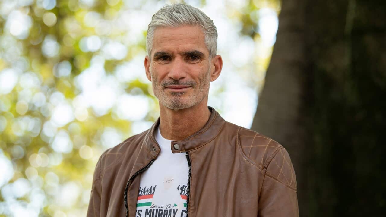 Former Socceroo's captain and sports commentator Craig Foster poses for a photograph during a Palm Sunday Rally for refugees at Belmore Park in Sydney, Sunday, April 14, 2019. (AAP Image/Paul Braven) NO ARCHIVING