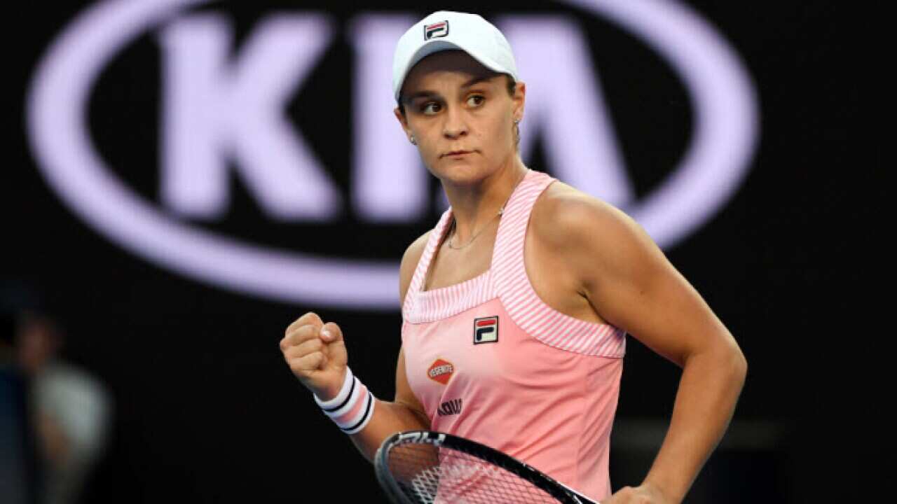 Australia's Ashleigh Barty after winning the match against Luksika Kumkhum of Thailand during day one of the Australian Open tennis tournament in Melbourne