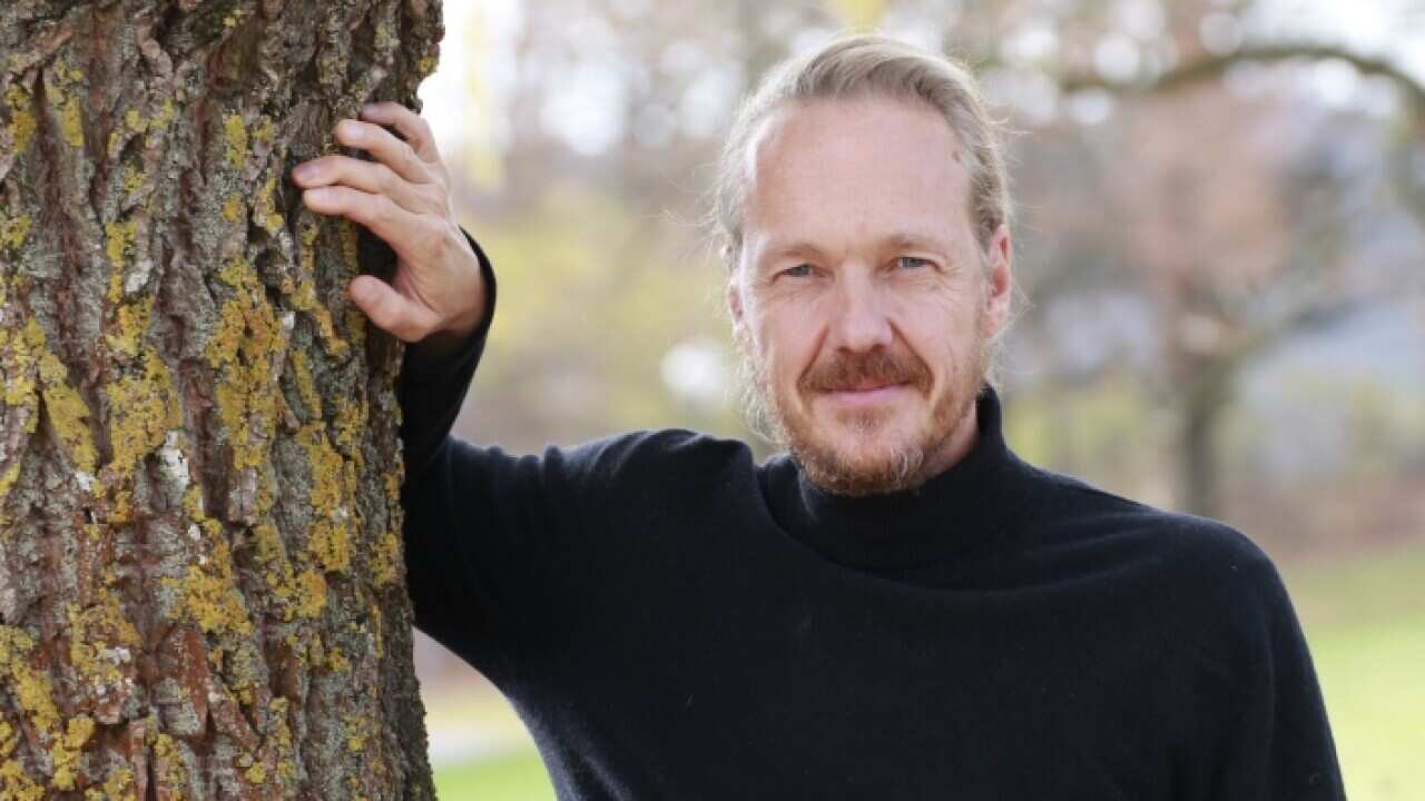 Dr. Patrick Broome an der Universität Augsburg: Vortrag zum Thema Yoga bei der Arbeit