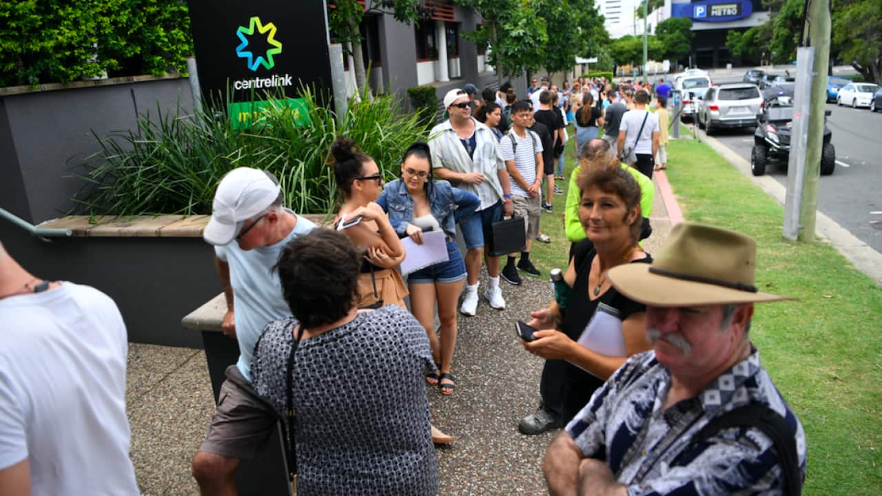 People queueing outside the Centrelink office last month.
