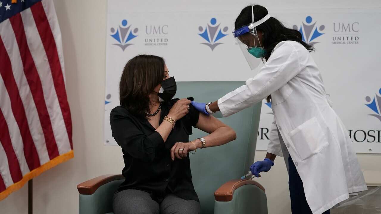 US Vice President-elect Kamala Harris receives the Moderna COVID-19 vaccine