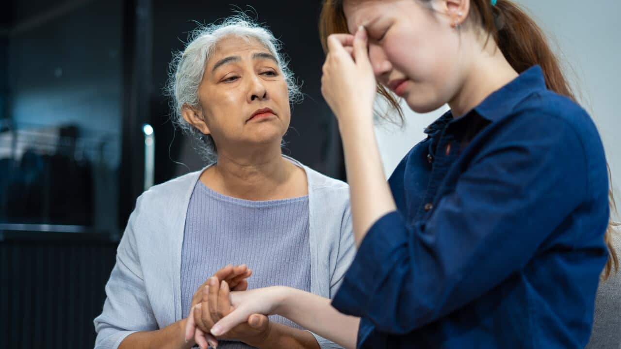 Granddaughter consoled and encouraged her grandmother with love.