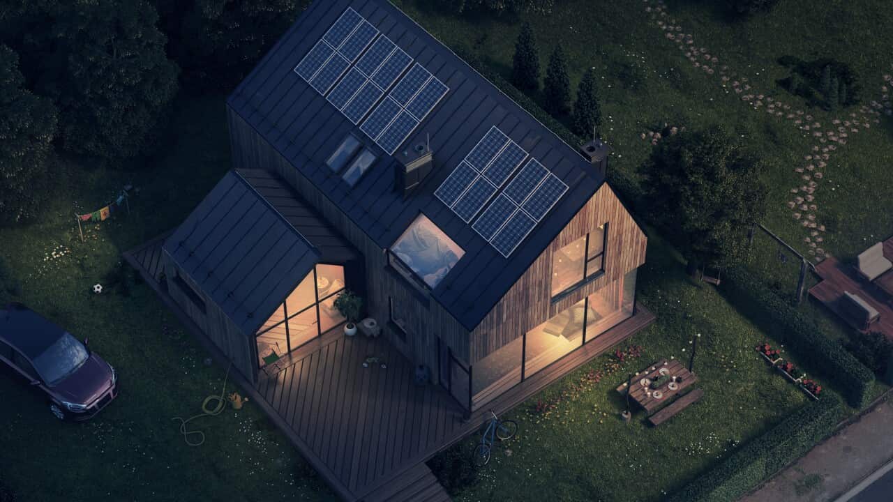 Modern house villa with solar panels - night version