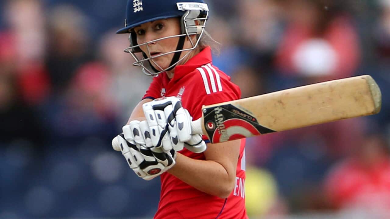 England's Charlotte Edwards plays a shot