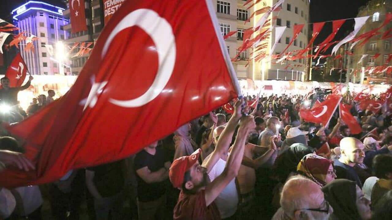 People wave the Turkish national flag to commemorate the one year anniversary of the failed coup in Istanbul, Turkey on July 13, 2017. More than fifty thousands of suspecgts related the coup ware in custody